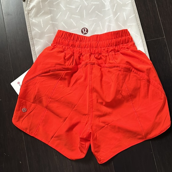 LULULEMON TRACK THAT HR SHORTS 5” in SOLAR ORANGE (SLRO) SZ 2 NWT - Picture 2 of 6